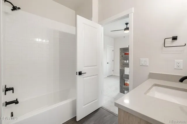 a bathroom with a sink and a tub