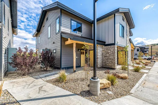 a front view of a house with entertaining space