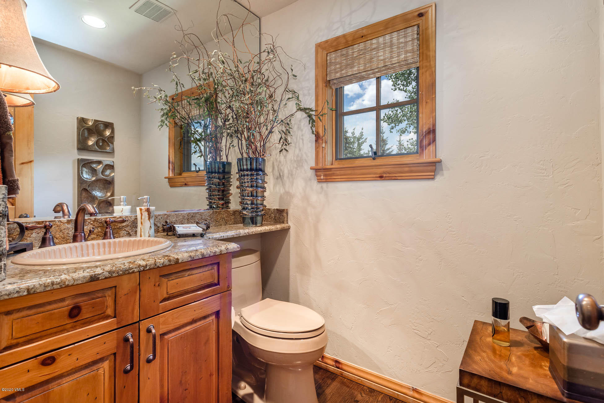 36 Fairway Lane Edwards, CO 81632 - Photo 13 of 37 a bathroom with a granite countertop toilet sink and mirror
