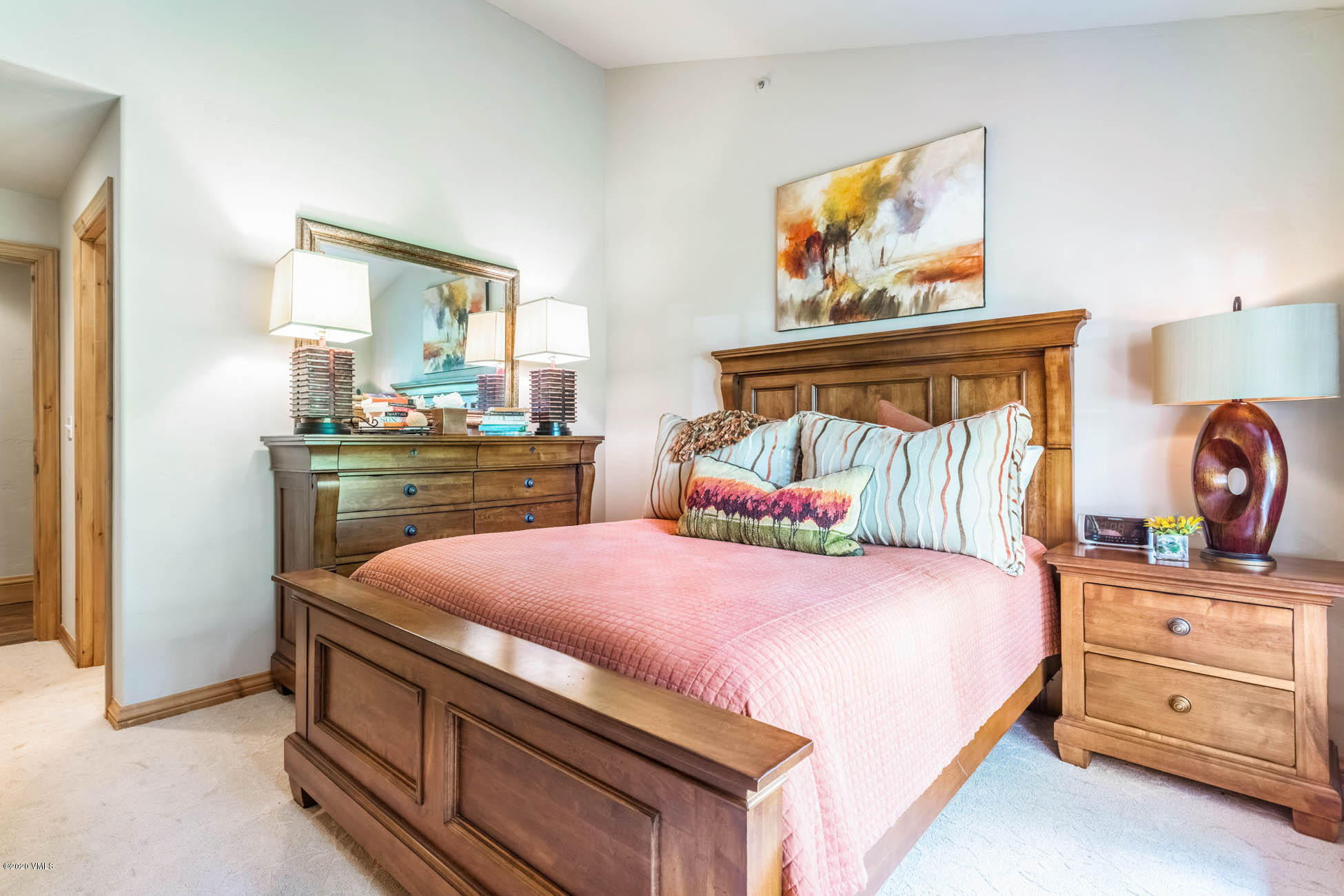 36 Fairway Lane Edwards, CO 81632 - Photo 15 of 37 a bedroom with a bed and a dresser in it