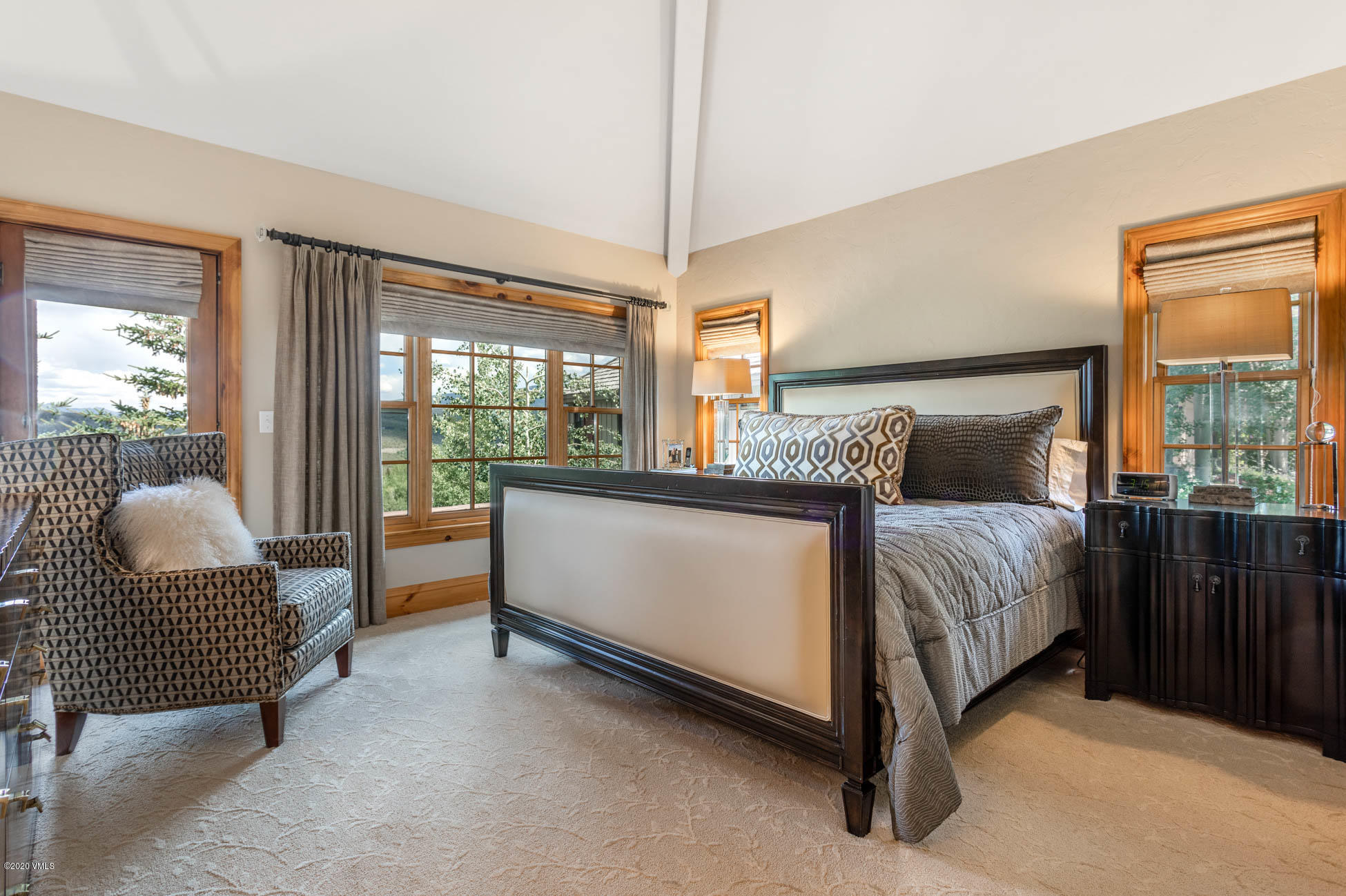 36 Fairway Lane Edwards, CO 81632 - Photo 17 of 37 a bedroom with a bed and glass window