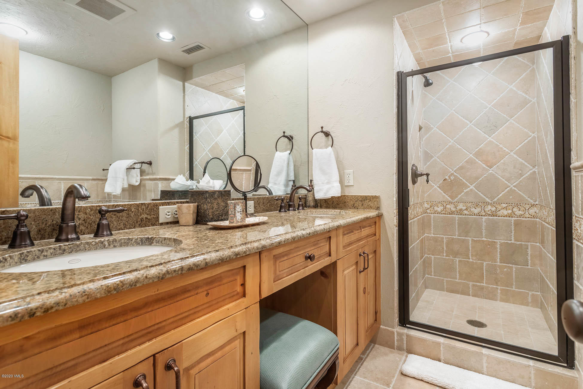 36 Fairway Lane Edwards, CO 81632 - Photo 37 of 37 a bathroom with a double vanity sink mirror and shower