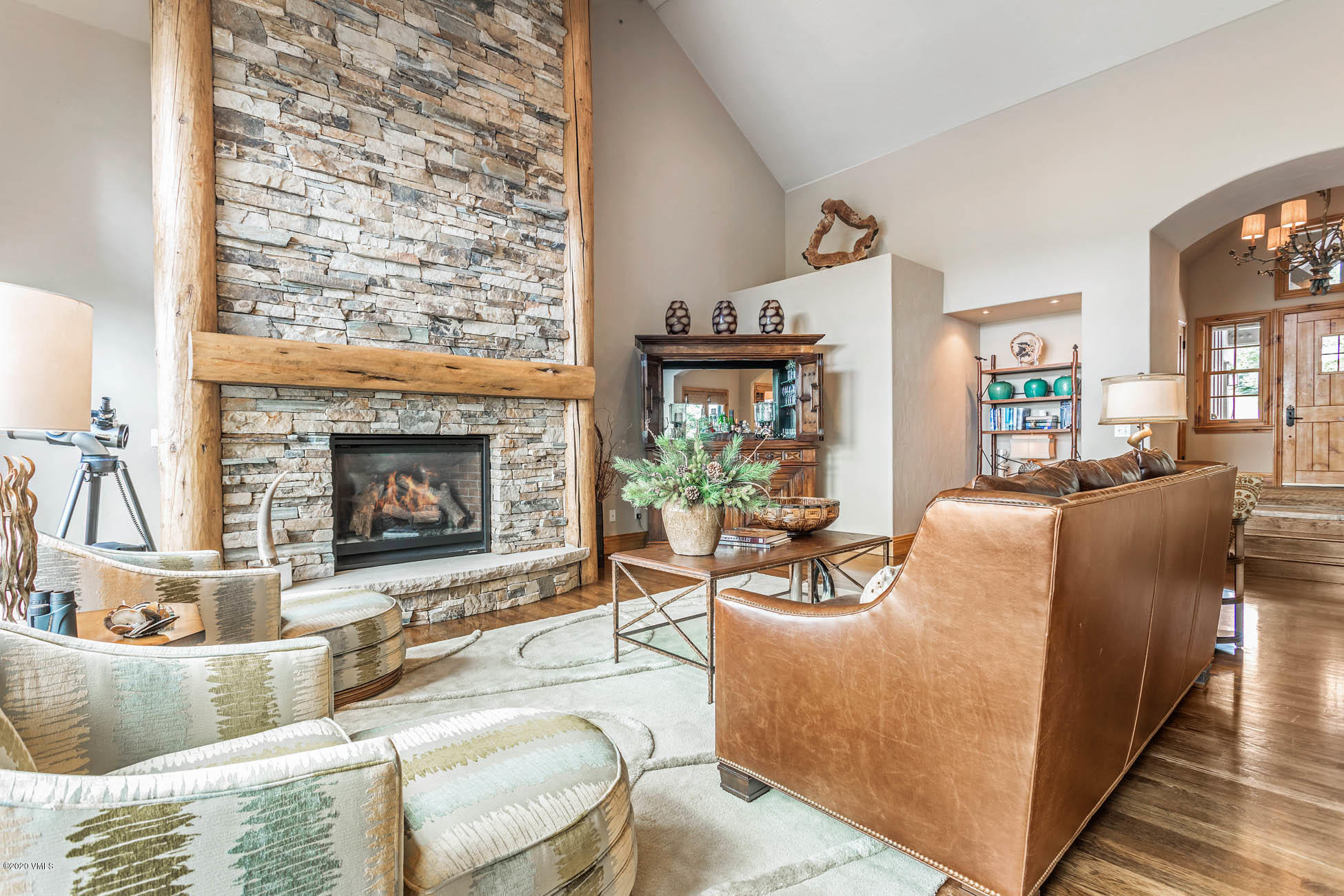 36 Fairway Lane Edwards, CO 81632 - Photo 7 of 37 a living room with furniture and a fireplace