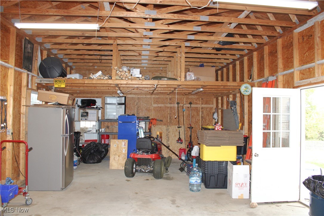 56 3rd Street Rayland, OH 43943 - Photo 27 of 46 Garage with freestanding refrigerator