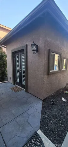 a view of a back yard of the house