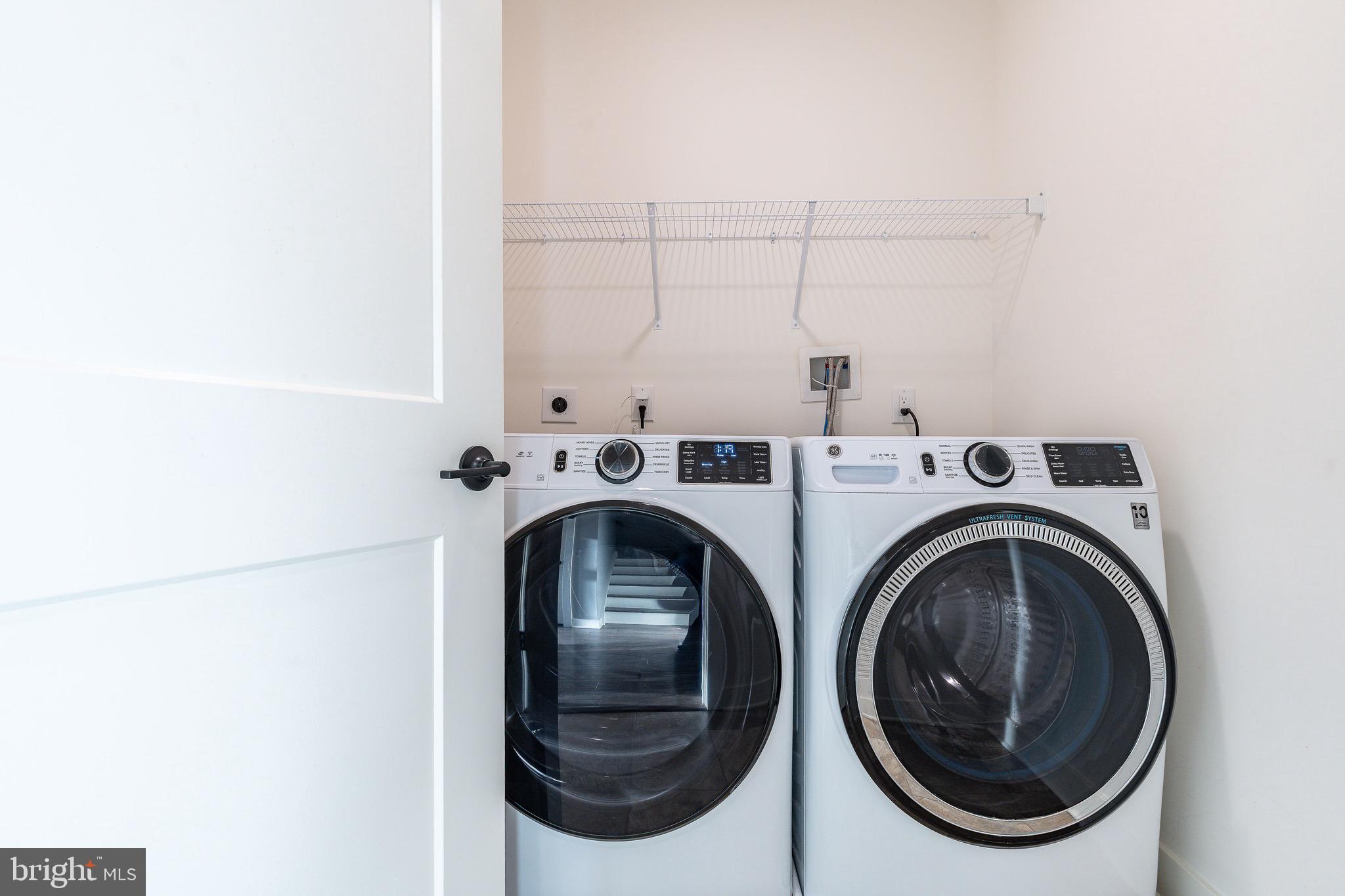 4523 Riverside Way Philadelphia, PA 19127 - Photo 29 of 50 a utility room with dryer and washer