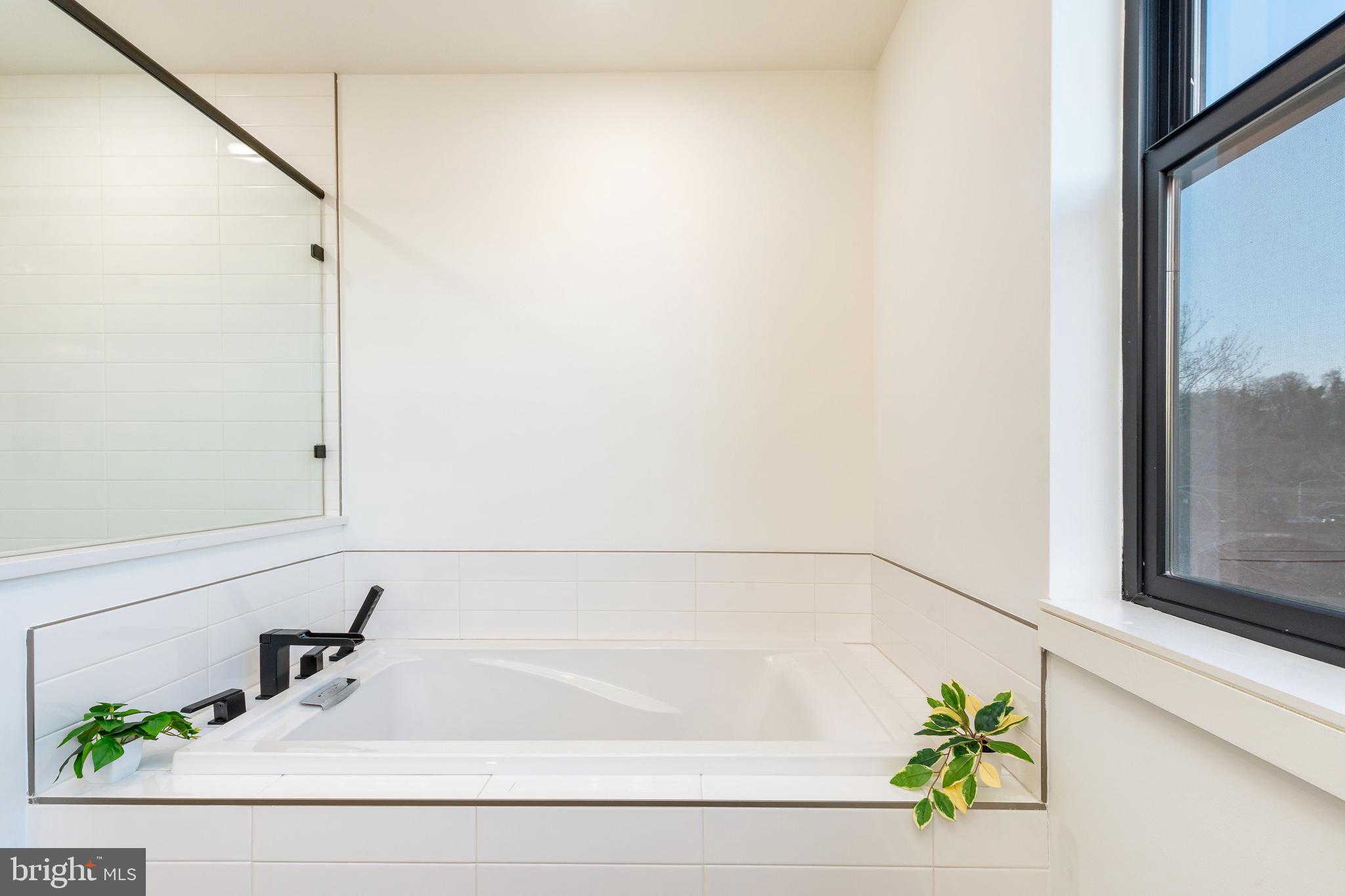 4523 Riverside Way Philadelphia, PA 19127 - Photo 37 of 50 a bathroom with a bathtub and a sink