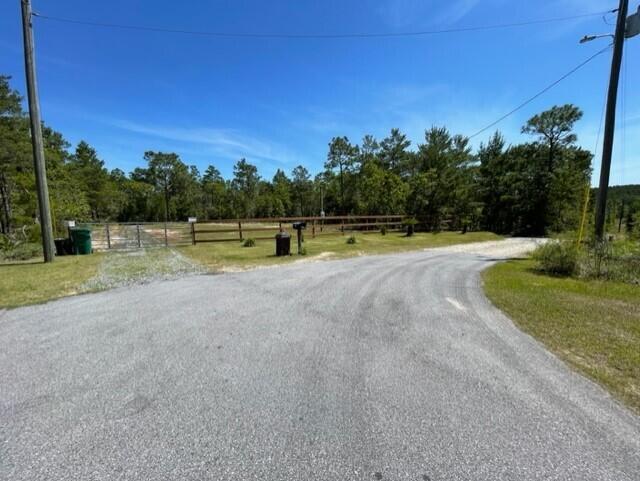 304 St James Road DeFuniak Springs, FL 32433 - Photo 11 of 37 a view of an outdoor space and tennis court