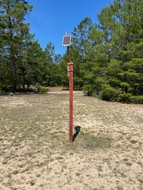 304 St James Road DeFuniak Springs, FL 32433 - Photo 25 of 37 a street sign on a wall next to a road