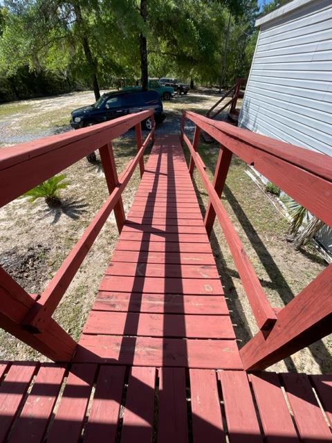 304 St James Road DeFuniak Springs, FL 32433 - Photo 28 of 37 a view of deck with a patio
