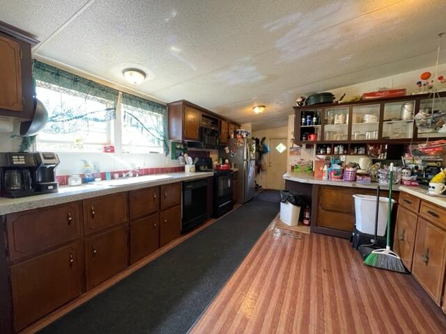 304 St James Road DeFuniak Springs, FL 32433 - Photo 31 of 37 a open kitchen with stainless steel appliances granite countertop a stove and cabinets