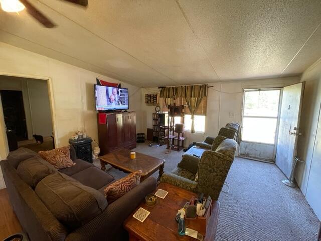 304 St James Road DeFuniak Springs, FL 32433 - Photo 32 of 37 a living room with furniture and a flat screen tv