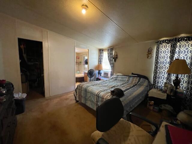 304 St James Road DeFuniak Springs, FL 32433 - Photo 34 of 37 a bedroom with a bed and a lamp