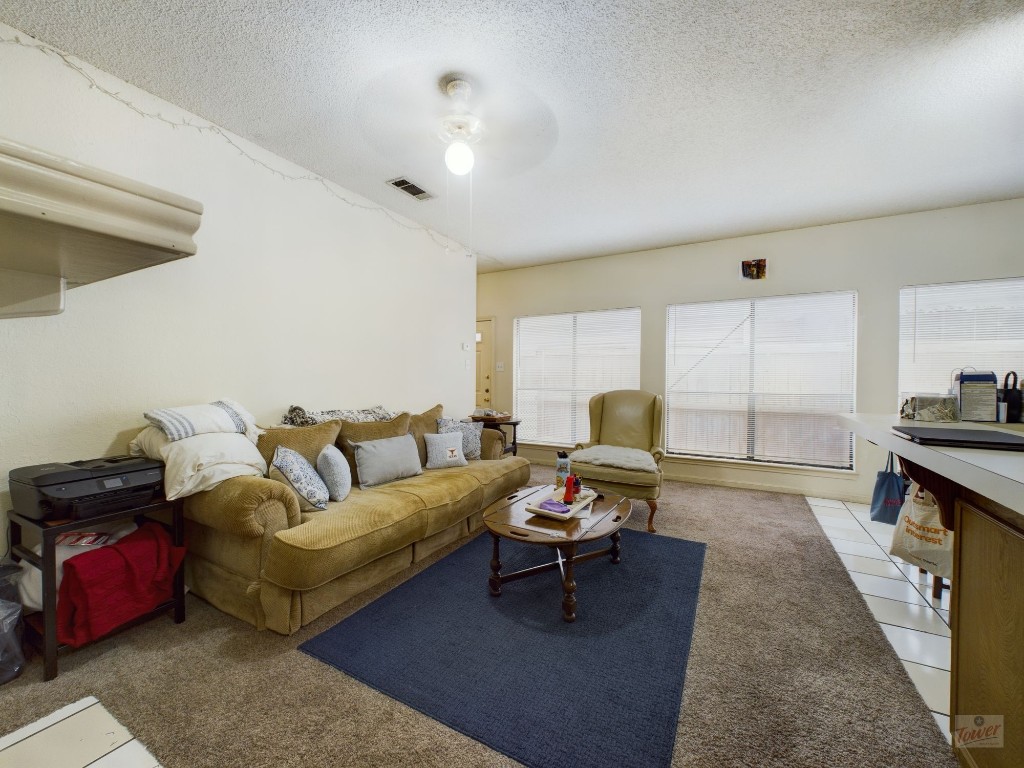 4111 Speedway, Unit 1 Austin, TX 78751 - Photo 6 of 14 a living room with furniture and a large window