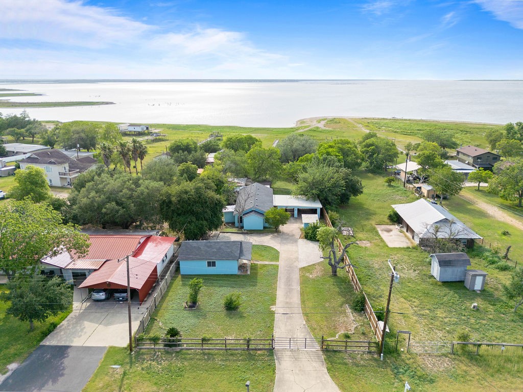an aerial view of a house with a garden