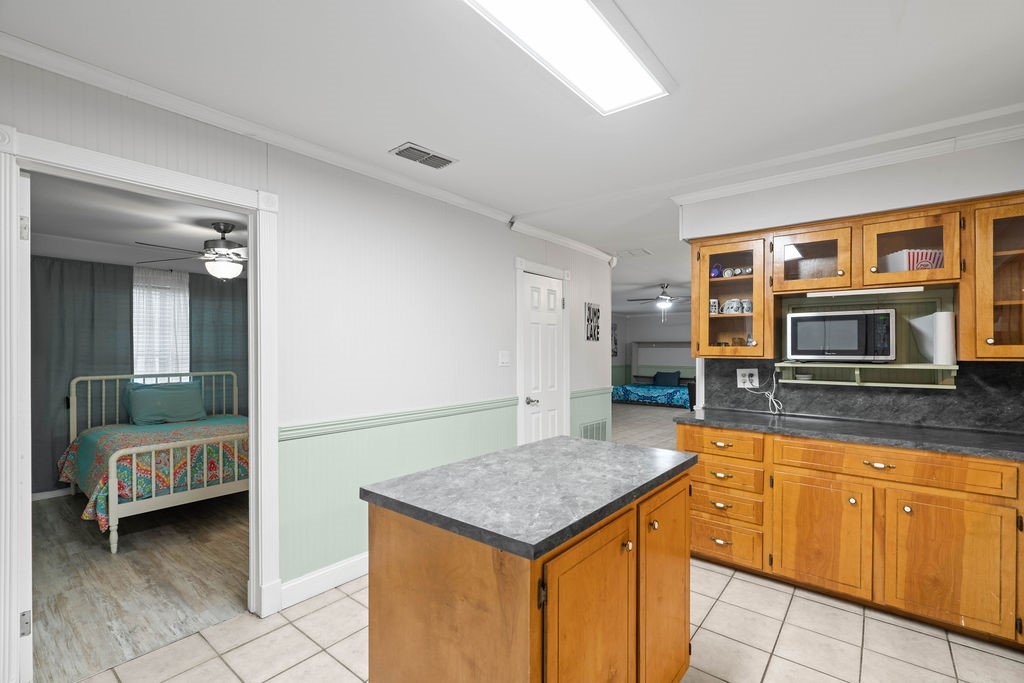 119 Century Drive Mathis, TX 78368 - Photo 11 of 38 a kitchen with a stove and a sink