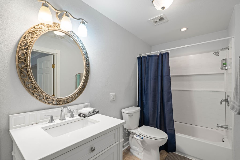 119 Century Drive Mathis, TX 78368 - Photo 12 of 38 a bathroom with a sink and a mirror