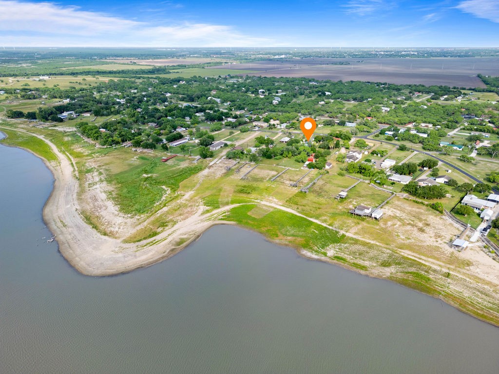 119 Century Drive Mathis, TX 78368 - Photo 23 of 38 a view of a lake in middle of the town