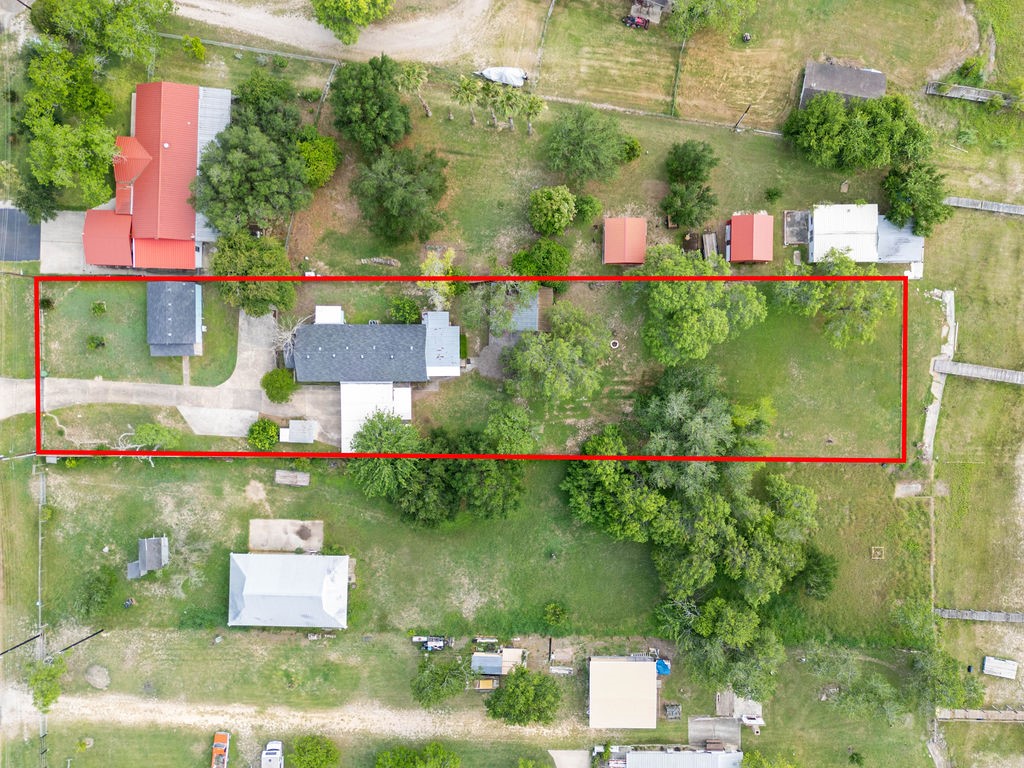 119 Century Drive Mathis, TX 78368 - Photo 28 of 38 an aerial view of a house with a yard and outdoor seating