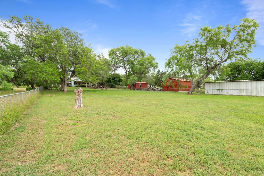 119 Century Drive Mathis, TX 78368 - Photo 35 of 38 a view of a swimming pool with an outdoor space and seating area