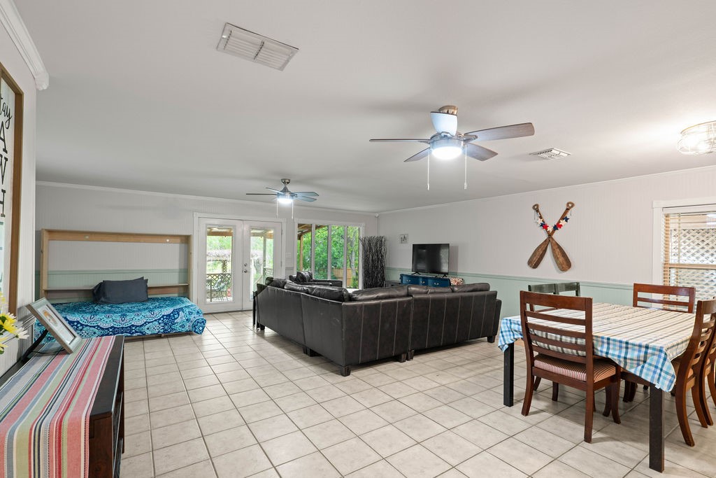 119 Century Drive Mathis, TX 78368 - Photo 6 of 38 a living room with furniture and a flat screen tv