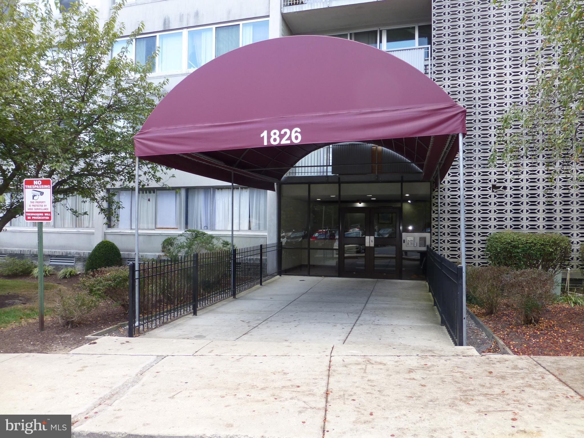 1826 Metzerott Road, Unit 408 Adelphi, MD 20783 - Photo 2 of 14 Building front. Entry with FOB key.