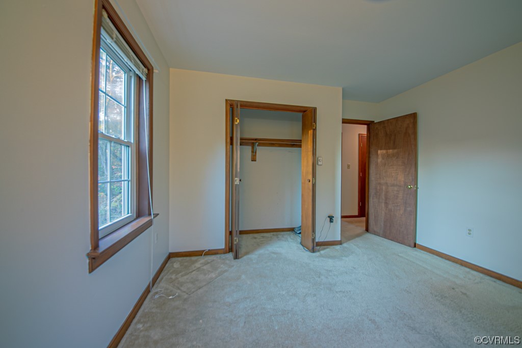 7212 Drexelbrook Road Chesterfield, VA 23832 - Photo 21 of 31 an empty room with windows and closet