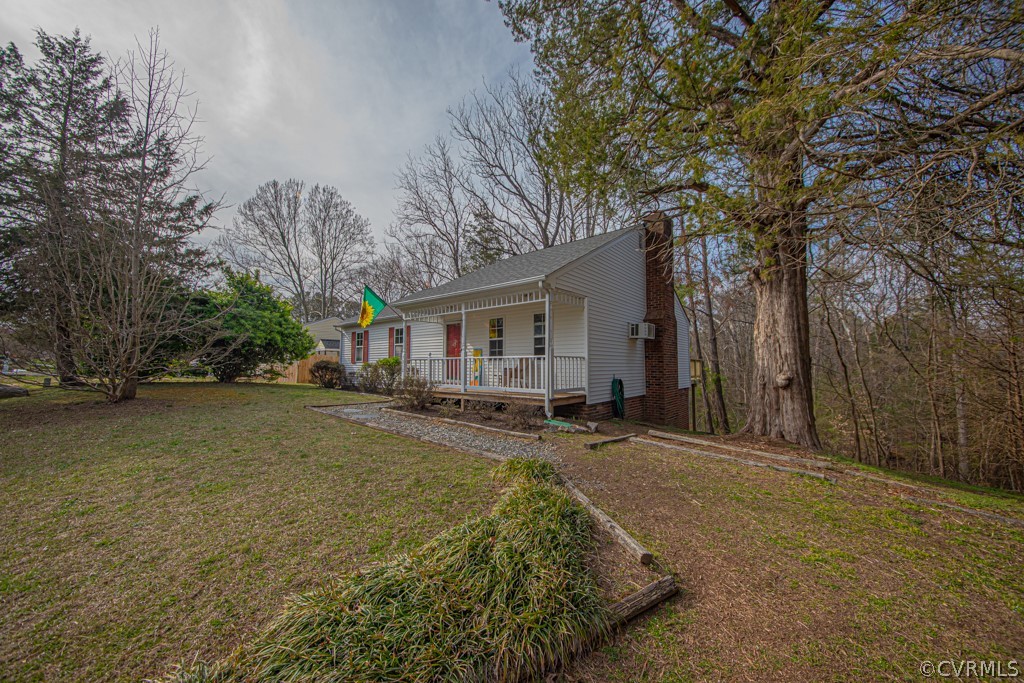 7212 Drexelbrook Road Chesterfield, VA 23832 - Photo 3 of 31 a front view of house with yard and trees around