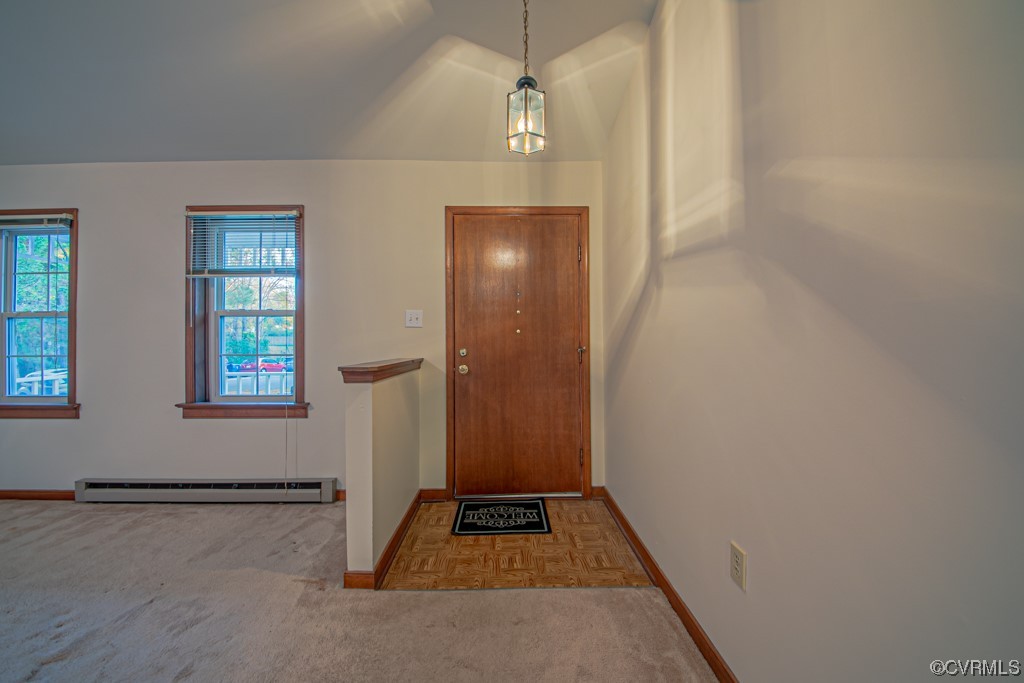 7212 Drexelbrook Road Chesterfield, VA 23832 - Photo 5 of 31 an entryway door with wooden floor in ceiling fan
