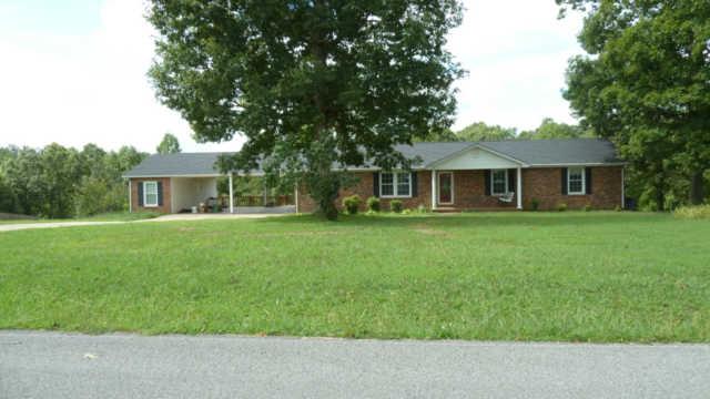 2248 Wolfe Road White Bluff, TN 37187 - Photo 1 of 9 Covered front porch with swing