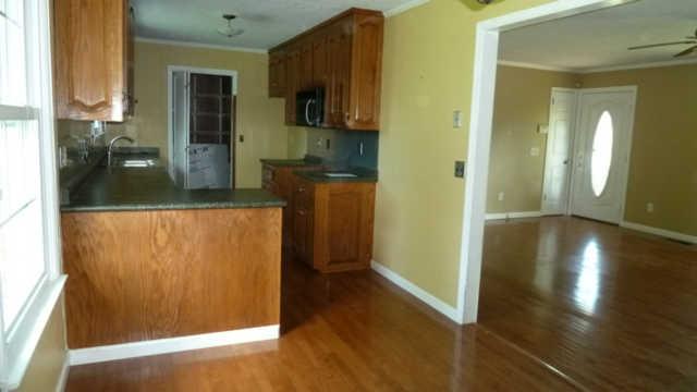 2248 Wolfe Road White Bluff, TN 37187 - Photo 3 of 9 Galley style kitchen with adjacent dining area
