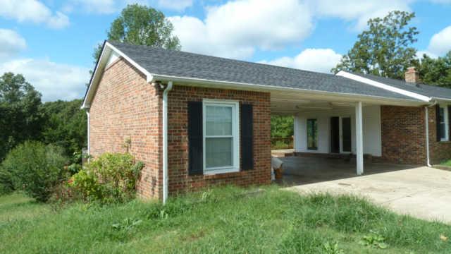2248 Wolfe Road White Bluff, TN 37187 - Photo 6 of 9 concrete driveway and 2 car carport