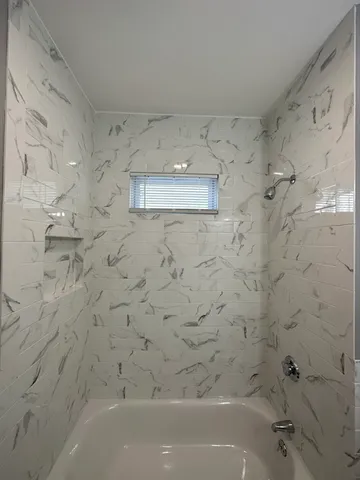 a bathroom with a bathtub