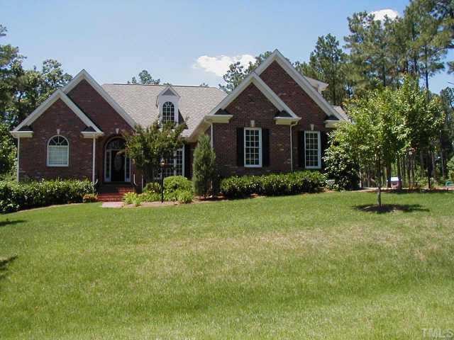 5011 Martin Farm Road Raleigh, NC 27613 - Photo 1 of 1 a front view of a house with a yard