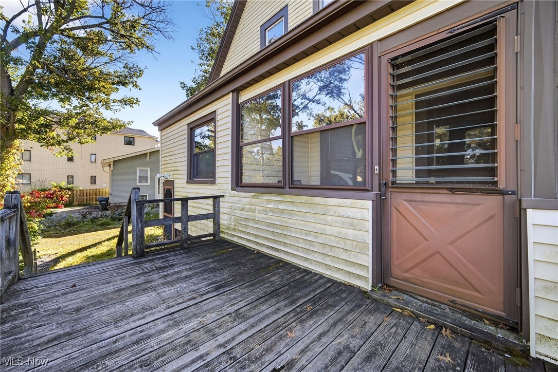 19560 Lorain Road Cleveland, OH 44126 - Photo 5 of 35 Deck featuring a sunroom