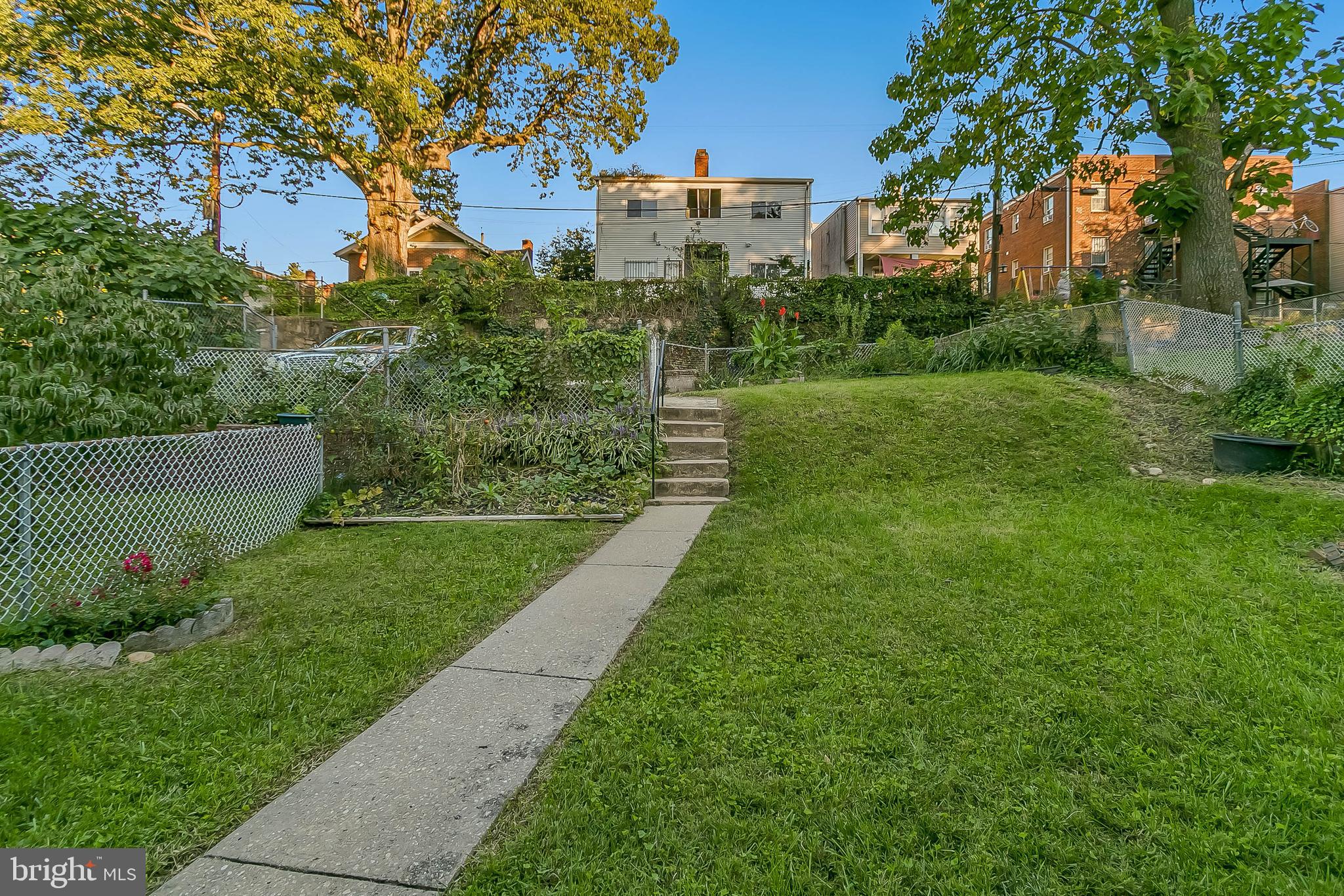 129 Raleigh Street Southeast Washington, DC 20032 - Photo 42 of 43 HUGE YARD SPACE IN THE BACK AND FRONT