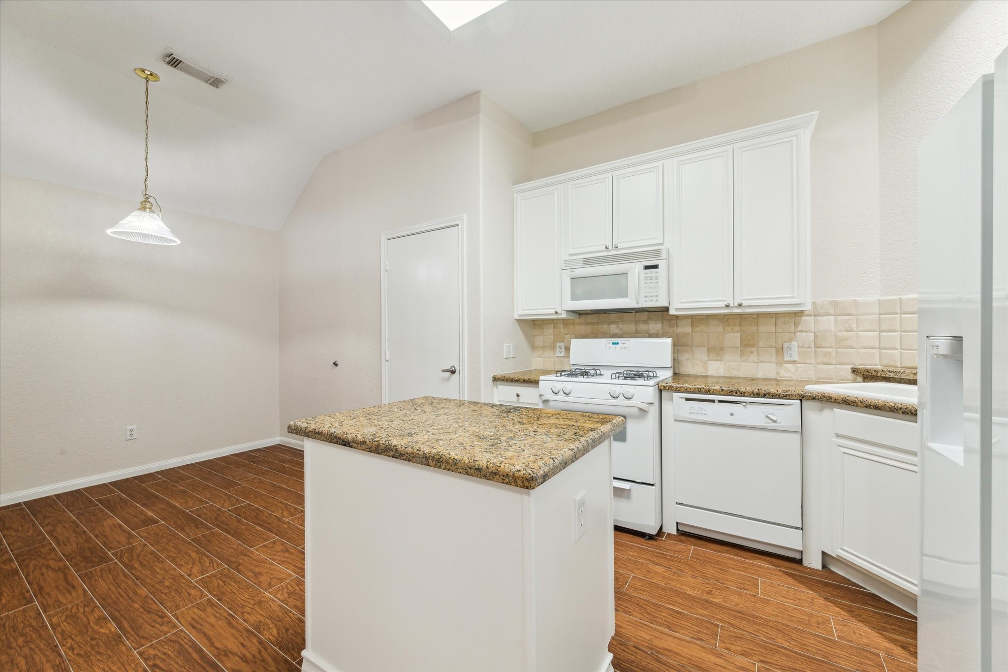 2806 Crescent Star Road Spring, TX 77388 - Photo 9 of 23 View of island kitchen and breakfast room.
