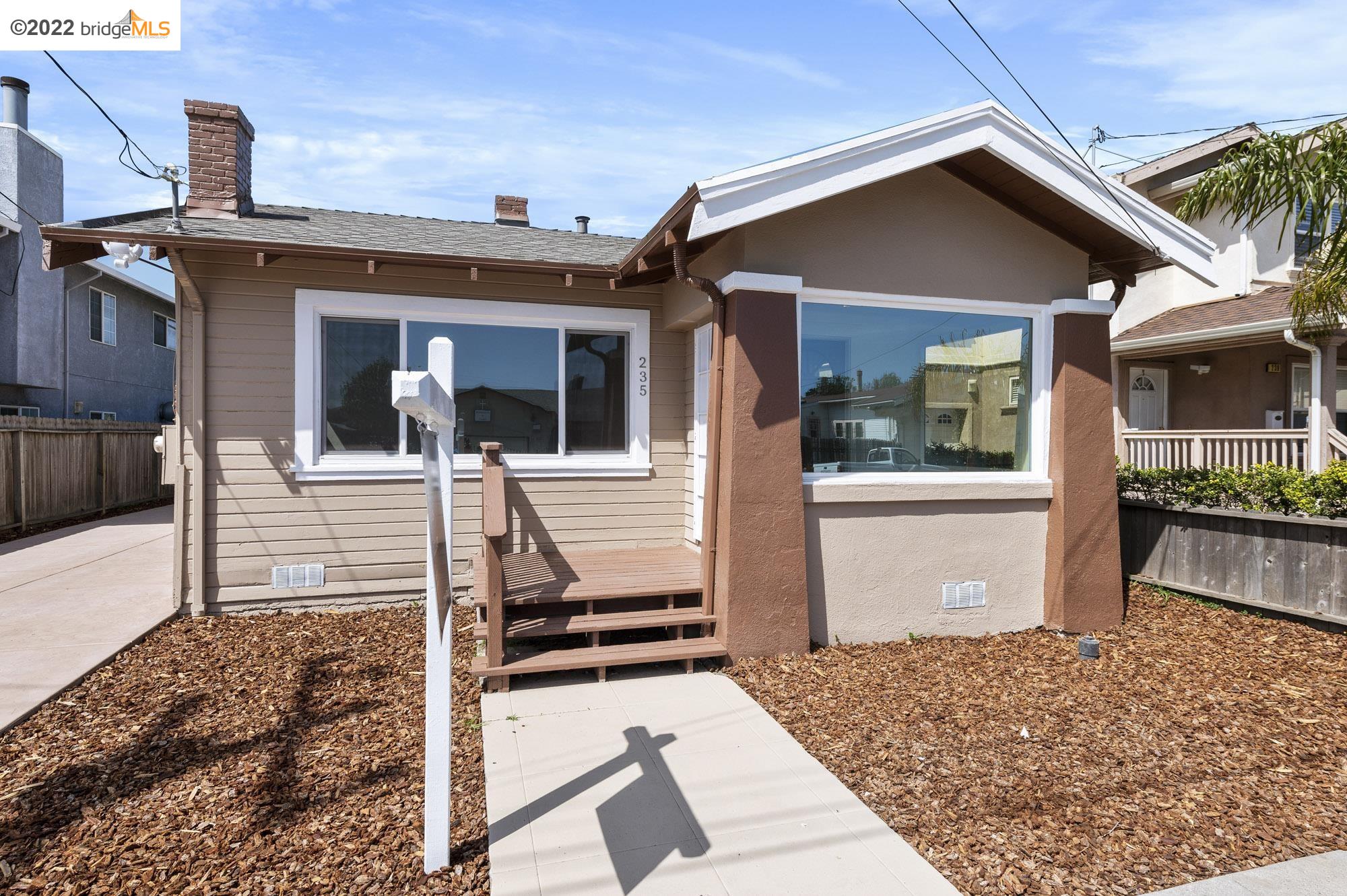 235 17th Street Richmond, CA 94801 - Photo 1 of 1 a front view of a house with a porch