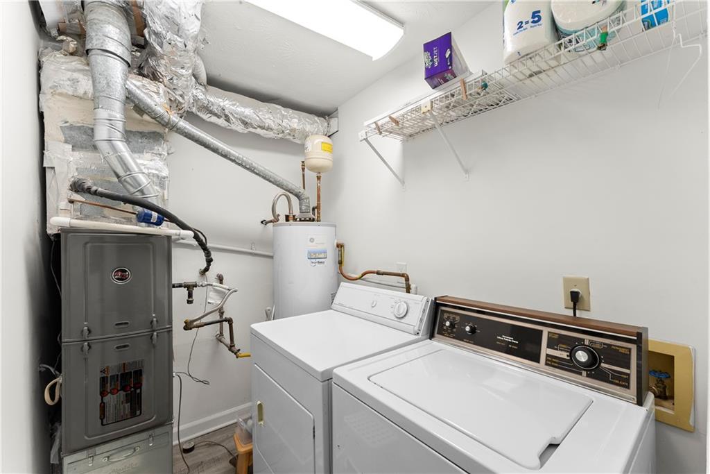 1997 Brian Way Decatur, GA 30033 - Photo 13 of 27 a utility room with dryer and washer