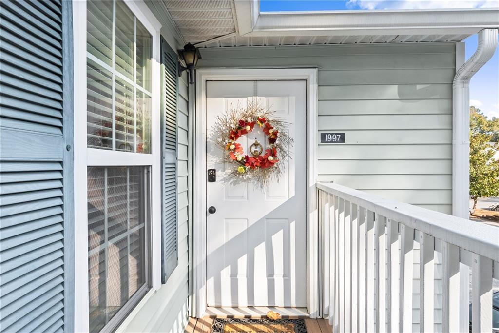 1997 Brian Way Decatur, GA 30033 - Photo 3 of 27 a view of a porch with wooden floor and stairs