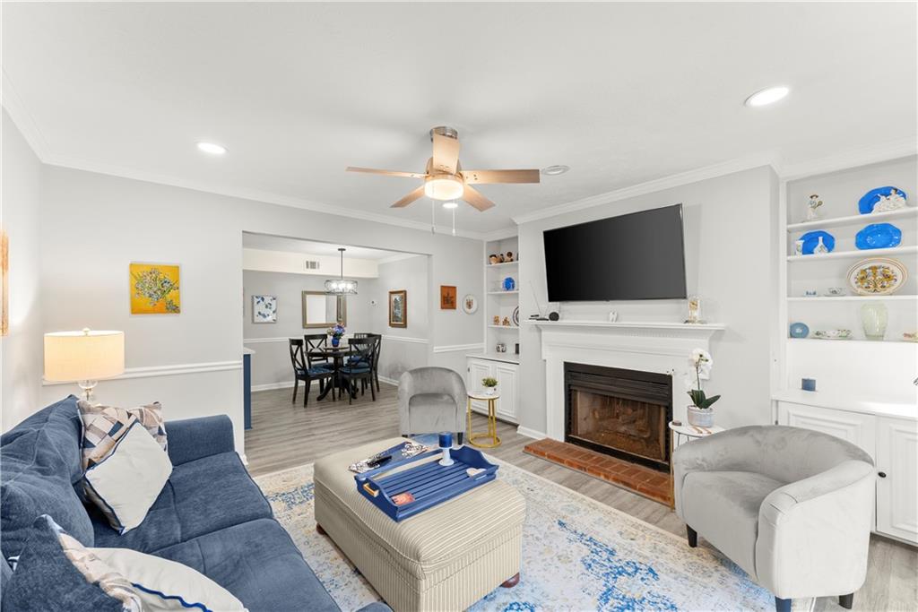 1997 Brian Way Decatur, GA 30033 - Photo 4 of 27 a living room with furniture a fireplace and a flat screen tv