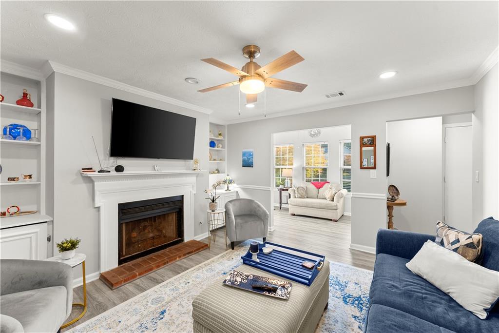 1997 Brian Way Decatur, GA 30033 - Photo 5 of 27 a living room with furniture a fireplace and a flat screen tv