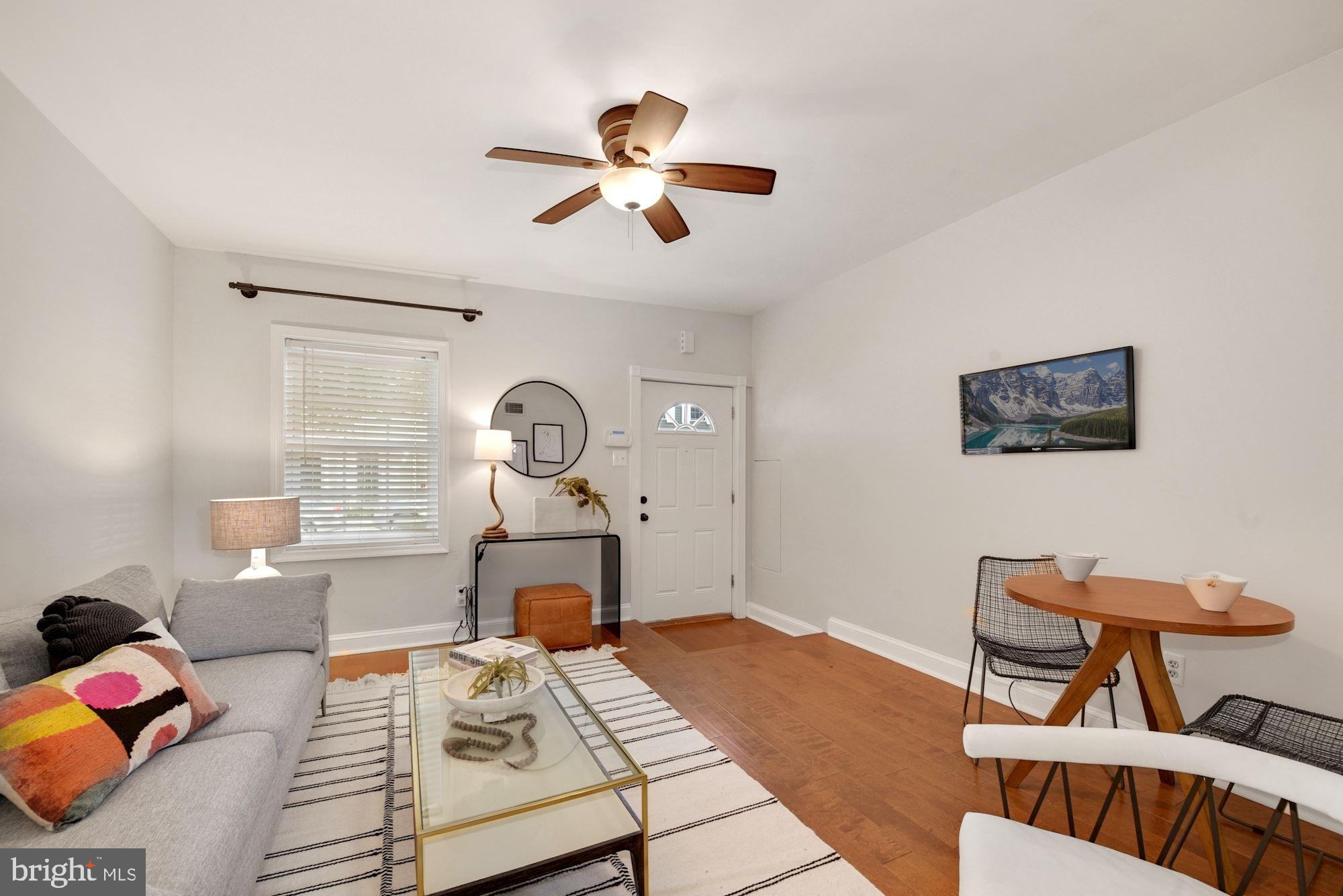 433 Ridge Street Northwest Washington, DC 20001 - Photo 2 of 15 staged with bistro table (current setup)