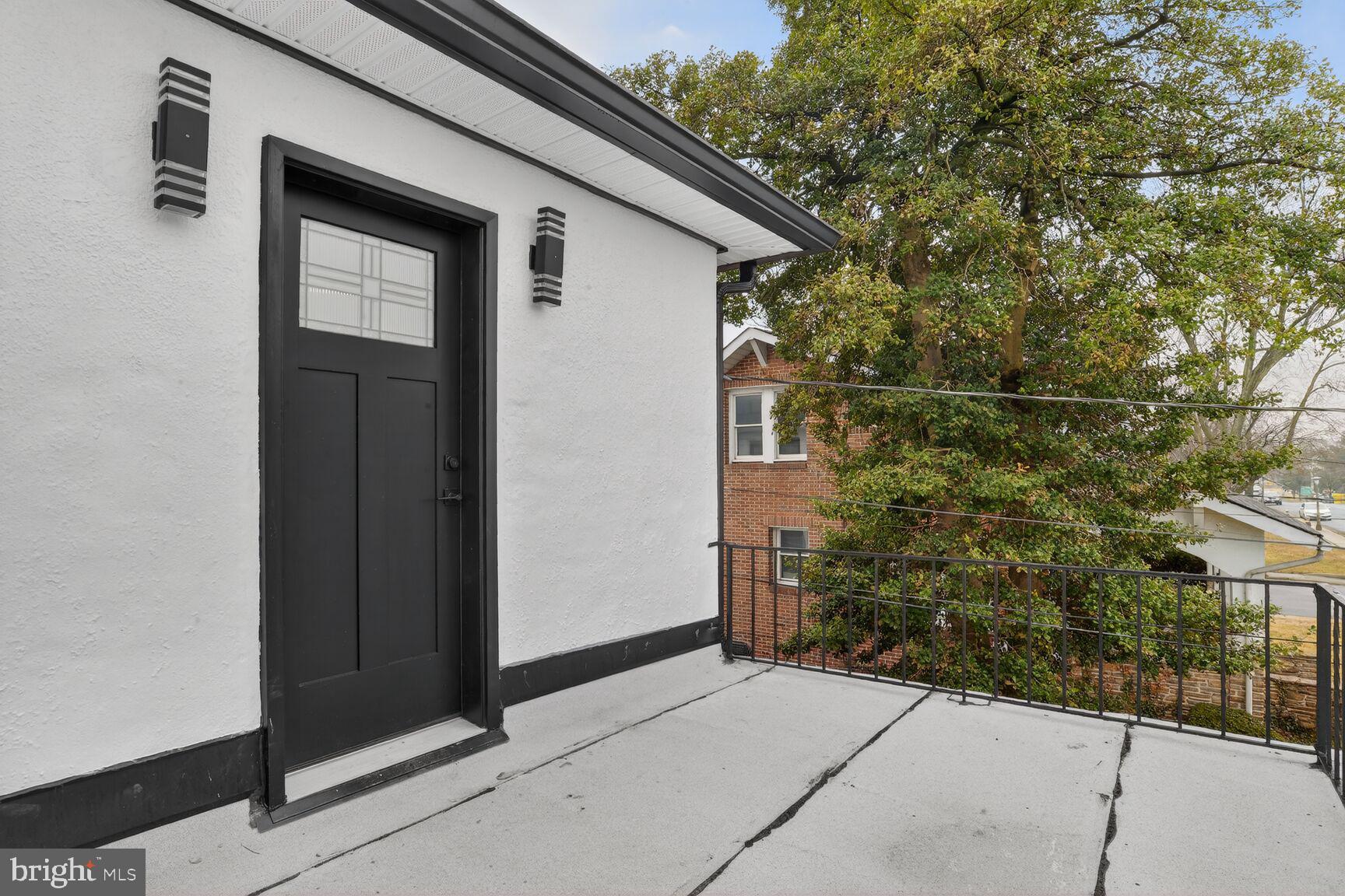 4013 4th Street Baltimore, MD 21225 - Photo 18 of 35 a backyard of a house with lots of green space