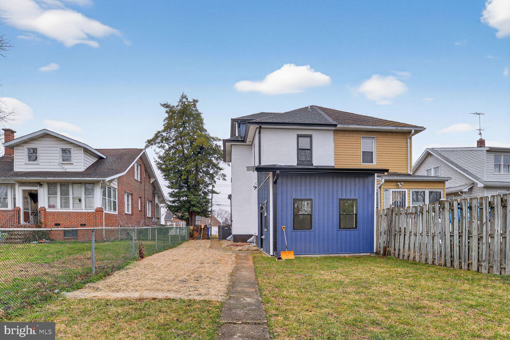 4013 4th Street Baltimore, MD 21225 - Photo 31 of 35 a view of a house with a yard