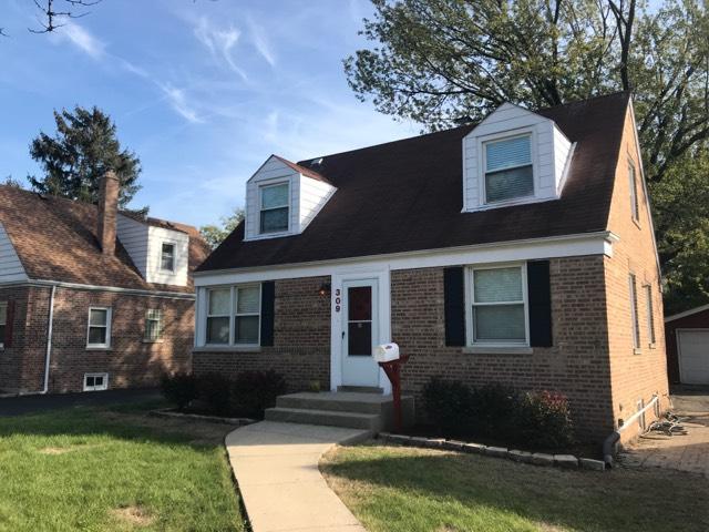 309 East Golf Road Des Plaines, IL 60016 - Photo 1 of 27 a front view of a house with a yard