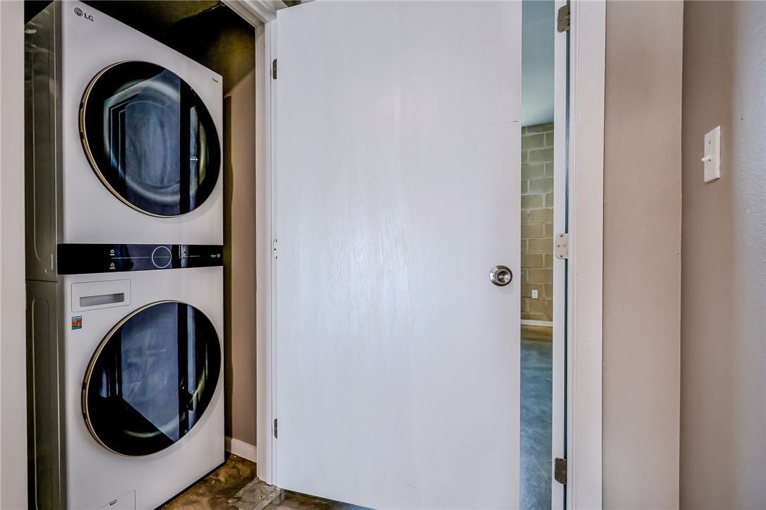 306 Easy Street, Unit B Corpus Christi, TX 78418 - Photo 17 of 24 a close up view of a washer and dryer