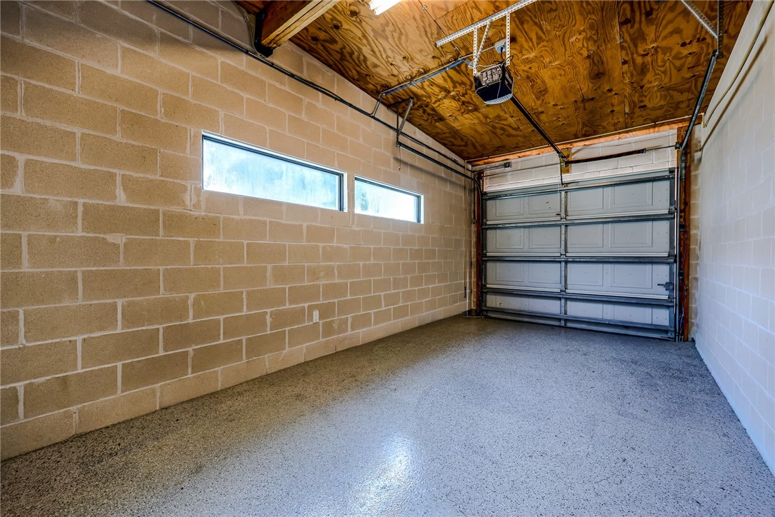 306 Easy Street, Unit B Corpus Christi, TX 78418 - Photo 18 of 24 a view of a room with racks on the wall