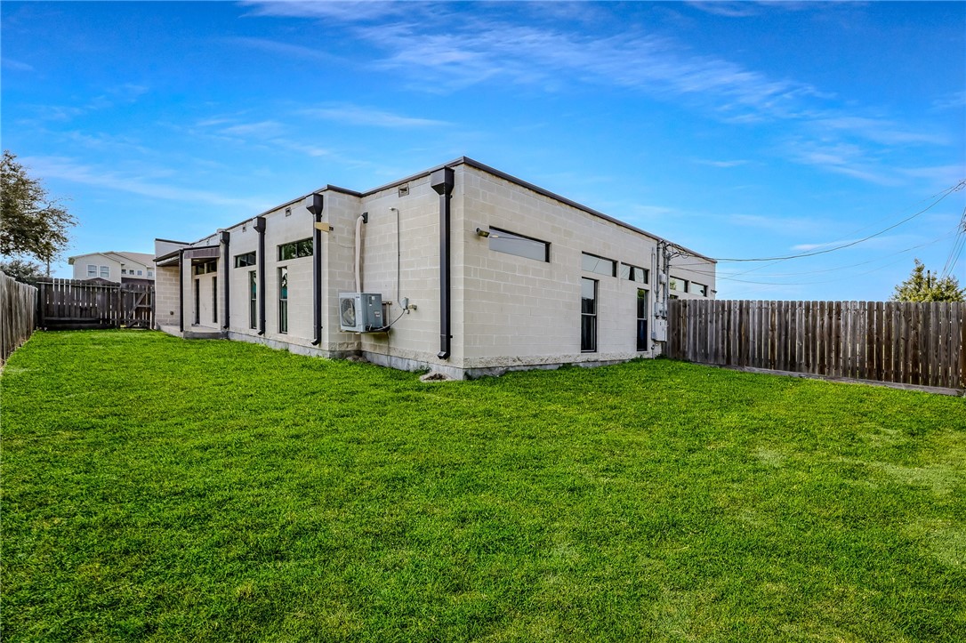 306 Easy Street, Unit B Corpus Christi, TX 78418 - Photo 20 of 24 a view of a house with backyard
