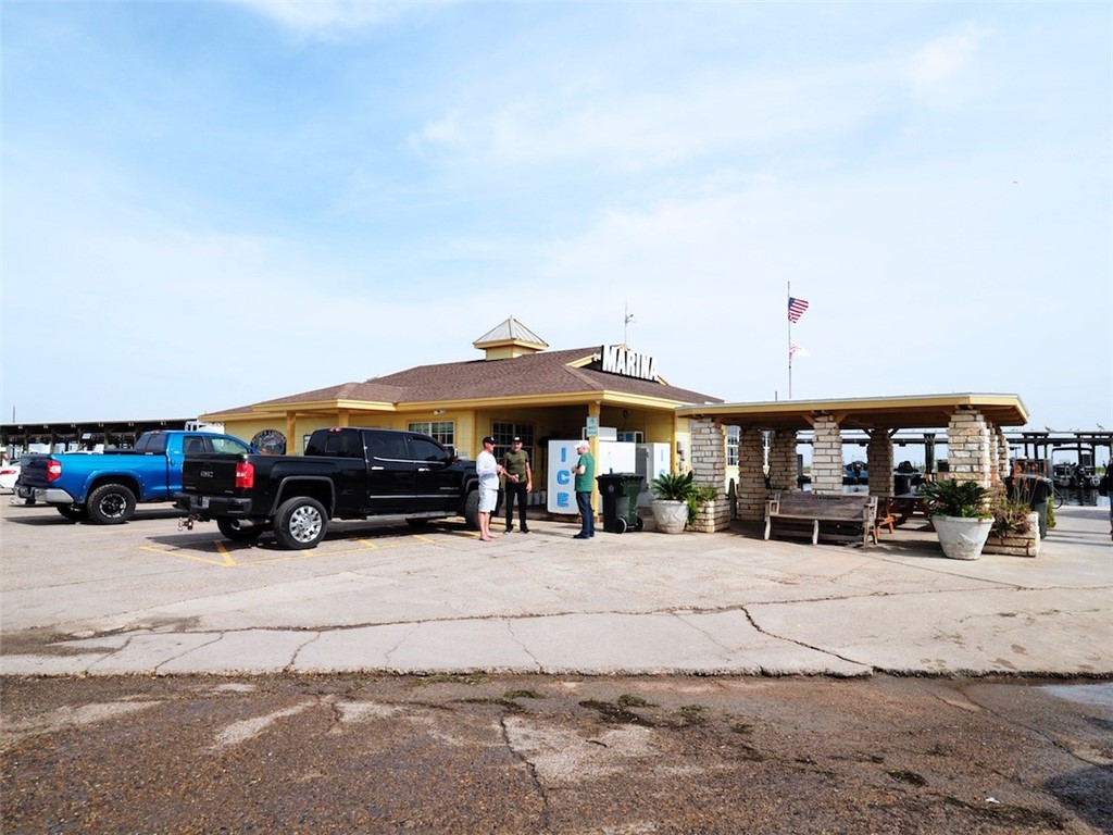 306 Easy Street, Unit B Corpus Christi, TX 78418 - Photo 23 of 24 a view of a car park in front of building